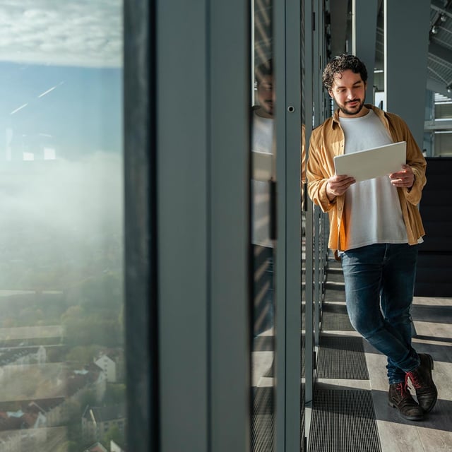 Man holding a tablet Man holding a tablet